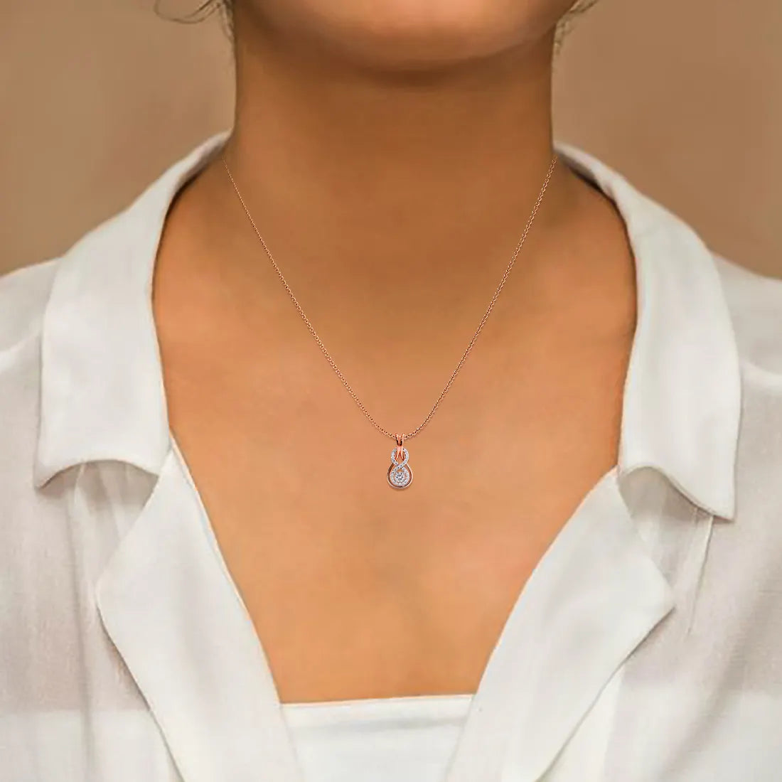 Symbolic Love Knot Diamond Pendant